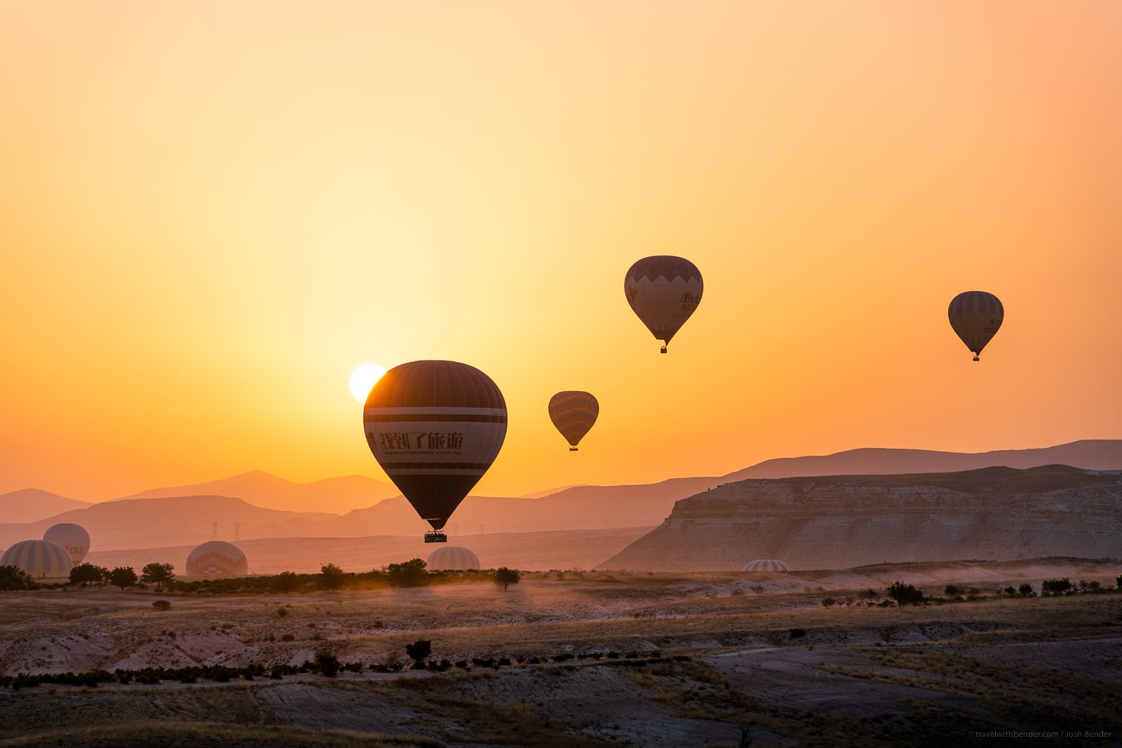 hot air balloons at sunrise