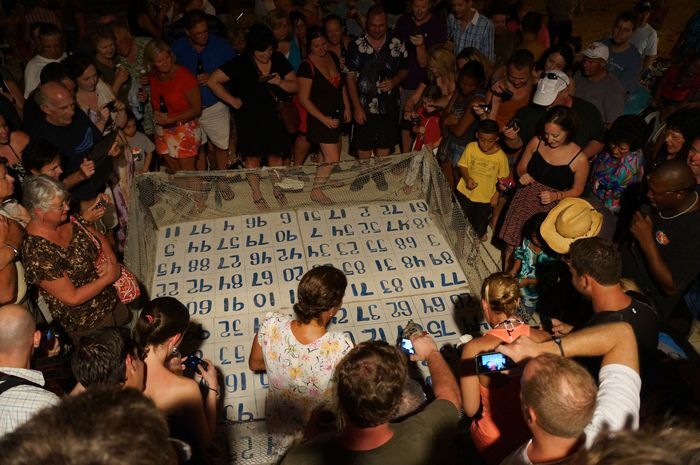 San Pedro’s Famous Chicken Drop – Where the Inebriated Cheer for Chicken Turd